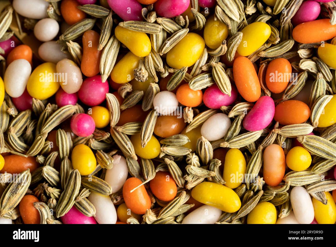 a-closeup-of-mukhwas-mouth-freshener-mix-of-fennel-seeds-raw-and-coloured-2RYDR9D